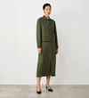 Full body view of a model wearing the Alexa Khaki Utility Jacket buttoned up facing side-on.